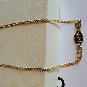 CHANEL Gold and Black Logo Charm